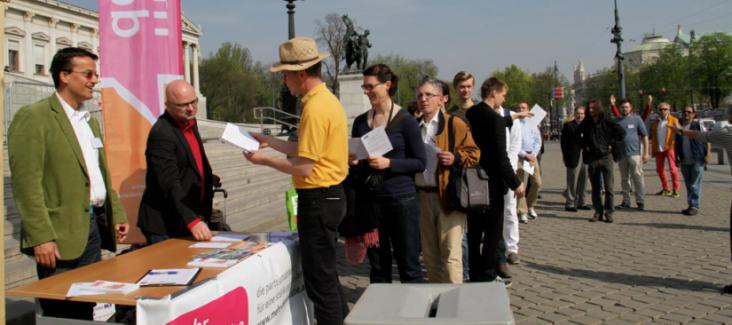 Erwin Mayer (left) campaigning for direct democracy